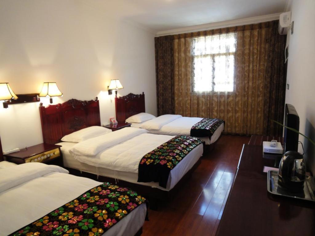 Dali Four Season Flower Inn Дали Номер фото